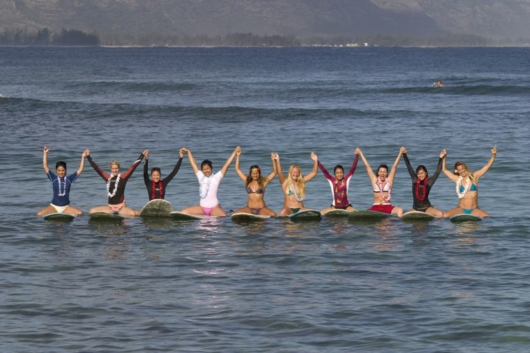 A Kelea group sharing the Aloha after a great surf session at Puena Point.